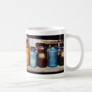 Mug Bouteilles orange, Brown et bleue de produits chim
