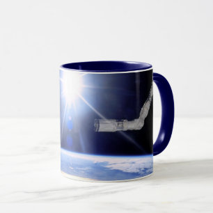 Mug Bras robotisé de la navette spatiale en orbite ter