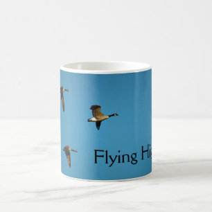 Mug Canadian geese in flight  