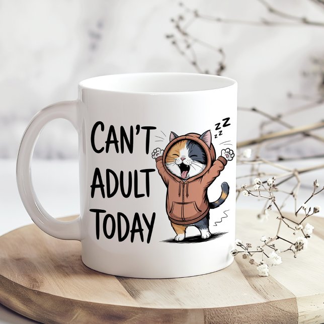 Mug "Can't Adult Today" Funny Cat ("Can't Adult Today" Funny Cat Coffee Mug on a sunny boho kitchen table with tiny dry flowers)
