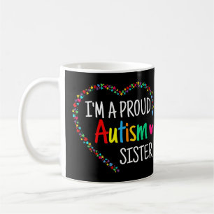 Mug Ce coeur autiste coloré fait de pièces de puzzle
