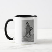 Chasseur de phoques d'Alaska avec raquettes Photog