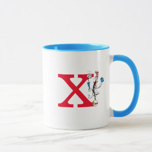 Mug Chat dans l'acte d'équilibre du chapeau Monogramme