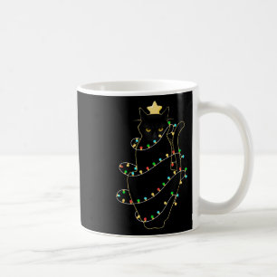 Mug Chat noir de Noël de Père Noël emmêlé dans les lum