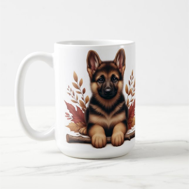 Mug  chiot berger allemand posé avec des feuilles d'au (Gauche)