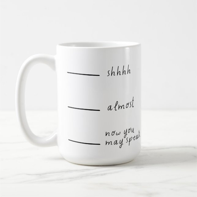 Mug Chut... Presque... Maintenant, vous pouvez parler  (Gauche)