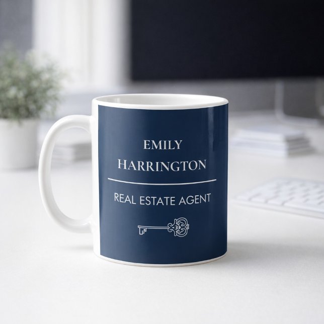 Mug Classic Key Navy Real Estate Agent (A mug on an office desk.)
