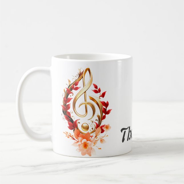 Mug Clé triplée dorée avec feuilles rouges. (Gauche)