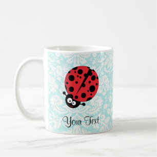 Mug Coccinelle turquoise de motif de damassé
