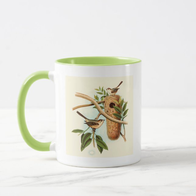 Mug Couple d'oiseaux sur un nid perché sur une branche (Gauche)