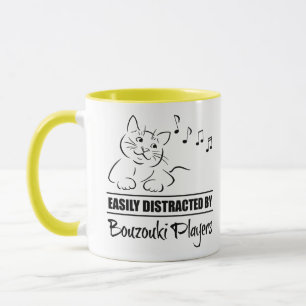 Mug Curious chat facilement distrait par les joueurs B