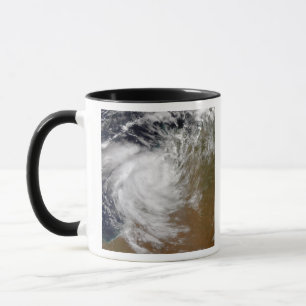 Mug Cyclone tropical Magda venant à terre dans austra