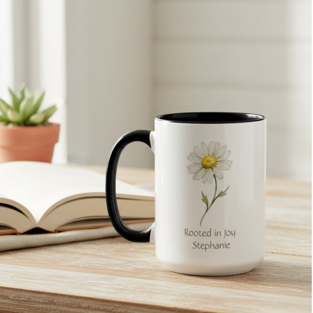 Mug Daisy Fleur de Naissance d'Avril Aquarelle (A "Rooted in Joy" daisy mug sits on a wooden table, a perfect thoughtful gift for her birthday.)