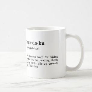 Mug Définition et prononciation de Tsundoku