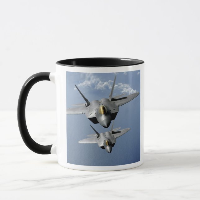 Mug Deux F-22 Raptors survolent l'océan Pacifique (Gauche)