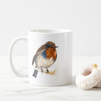 Mug en céramique avec un rouge-gorge regardant à g