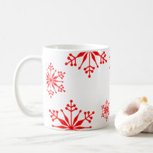 Mug festive avec des flocons de neige rouges.