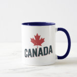 Mug Feuille d'érable du Canada<br><div class="desc">Le design canadien simple et fier "Canada" représente une feuille d'érable vintage. Ce dessin patriotique canadien fait un joli cadeau à n'importe quel Canadien fier pour la fête du Canada,  ou pour n'importe quelle période de l'année où vous voulez montrer votre fierté canadienne.</div>