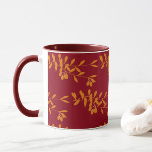 Mug Feuilles de branches de silhouette orange sur roug