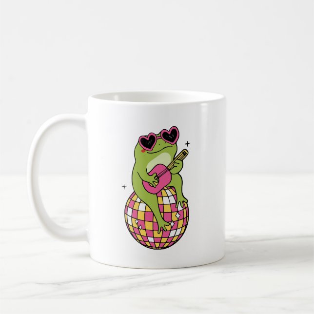 Mug Grenouille assise sur un ballon de danse jouant de (Gauche)