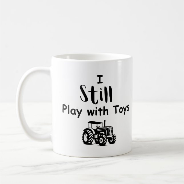 Mug Grosse citation de garçon : Je joue toujours avec  (Gauche)