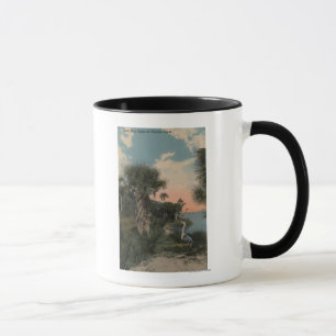 Mug Héron de grand bleu sur la plage de côte de la