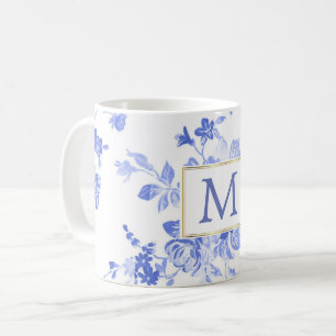Mug initiale bleue de porcelaine de fleur blanche