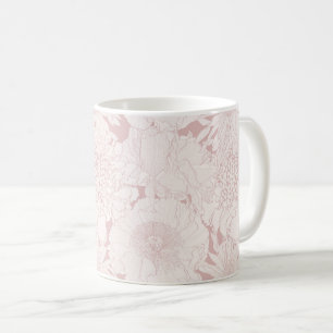 Mug Jardin à la main et fleurs tropicales.