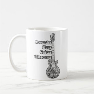 Mug Je me demande si ma guitare me manque. Noir et bla