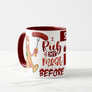 Mug Je Rube Ma Viande avant de la coller dans un BBQ a