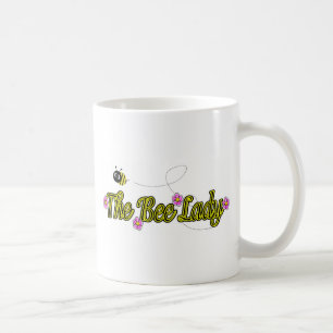 Mug la dame d'abeille avec des fleurs