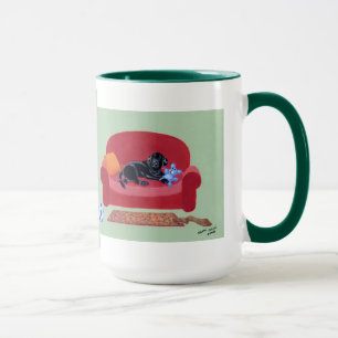 Mug Labrador noir sur la peinture rose de divan