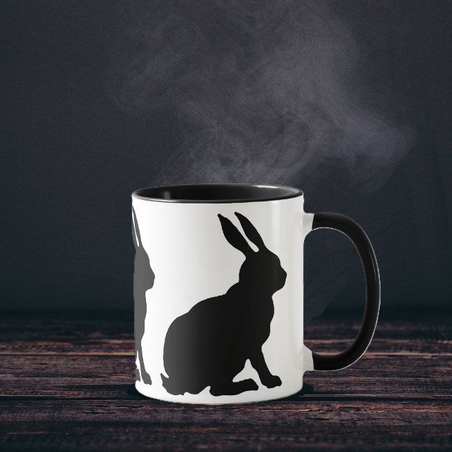 Mug Lapins Silhouette Noire (Ring of sitting black silhouette rabbits with tall ears on white coffee or tea mug.)