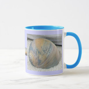 Mug Le coquillage dans le coucher du soleil colore la