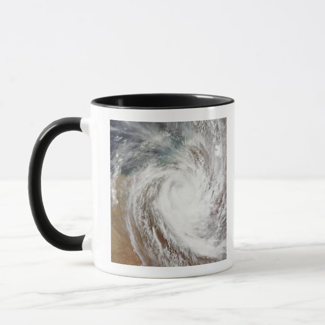Mug Le cyclone Laurence s'éloigne de l'intérieur (Gauche)