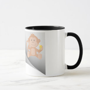 Mug le singe mange de la banane sous le patch