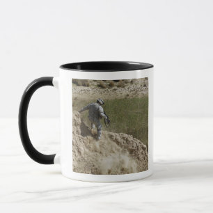 Mug Le spécialiste s'élève vers le bas