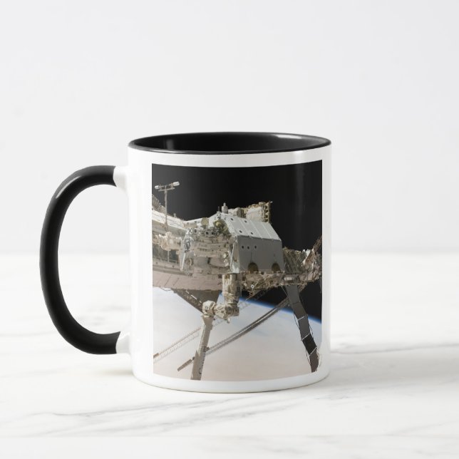Mug Le système robotique Dextre construit au Canada (Gauche)