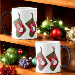 Mug Magic Snowman Plaid Scarf Hanging Christmas Stocking<br><div class="desc">Cette tasse de Noël en céramique amusante est ornée d'une photo d'un bas rouge et vert avec un bonhomme de neige adorable,  habillé d'un foulard et d'un ensemble casquette de saison. Commandez en 11 oz ou 15 az ou l'un des autres styles de buverie.</div>