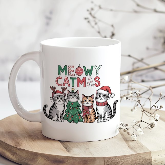 Mug Meowy Catmas Cute Christmas Cats – Funny Holiday (Meowy Catmas Cute Christmas Cats – Funny Holiday Coffee Mug on a wooden kitchen table.)