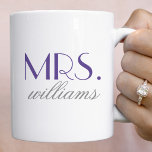 Mug Monogramme Élégant Mariage Mme Violet<br><div class="desc">Cette tasse Mme saisissante présente une typographie serif élégante surdimensionnée en violet riche avec un nom de famille personnalisé en écriture délicate en dessous. Le ton violet royal sur un fond blanc propre fait une déclaration sophistiquée et élégante. Le nom de famille est entièrement modifiable pour un souvenir personnalisé. Un...</div>