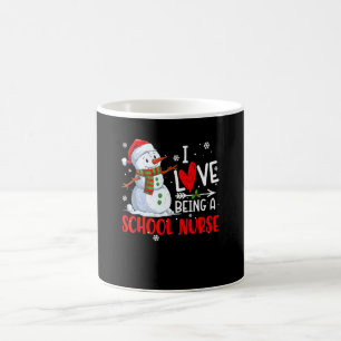 Mug Noël J'adore être une infirmière scolaire Bonhomme