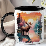 Mug Oie à Sunset Lake Réflexion<br><div class="desc">Ajoutez une touche de nature sauvage à votre routine matinale avec l'orignal de Sunset Lake Reflection Mug. Cette magnifique tasse présente un orignal majestueux debout dans un lac serein au coucher du soleil, avec les couleurs vibrantes du soleil couchant et la forêt paisible magnifiquement réfléchie dans l'eau. Customisé de votre...</div>