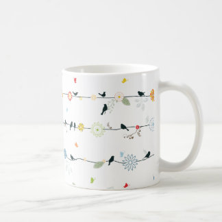 Mug Oiseaux féminins sur un fil et des fleurs