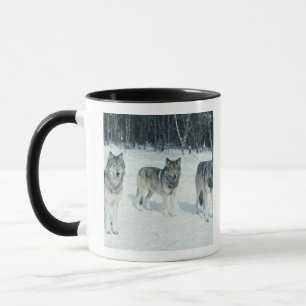 Mug Paquet de loups au bord de la forêt neigeuse
