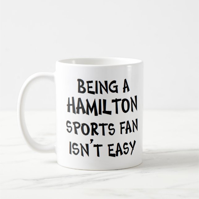 Mug partisan de sport de Hamilton, étant (Gauche)