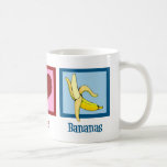 Mug Peace Love Bananas<br><div class="desc">J'adore manger des fruits,  surtout des bananes jaunes délicieuses.</div>
