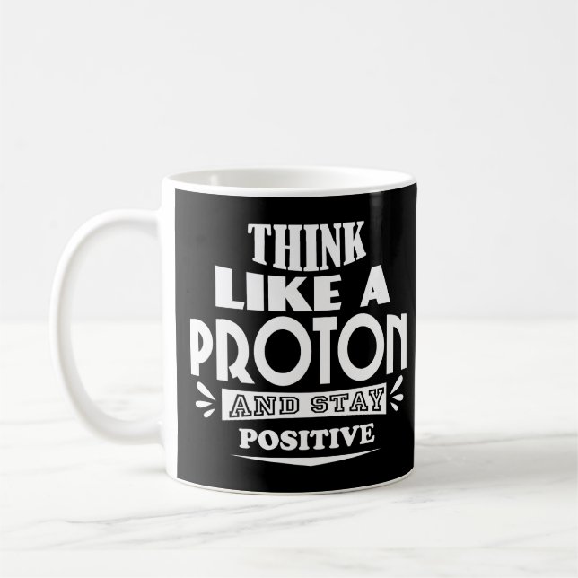 Mug Pensez comme un proton et restez positif (Gauche)