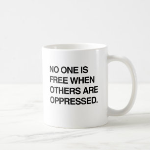 MUG PERSONNE N'EST LIBRE QUAND LES AUTRES SONT OPPRIMÉ
