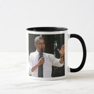 Mug Président Barack répond à des questions sur